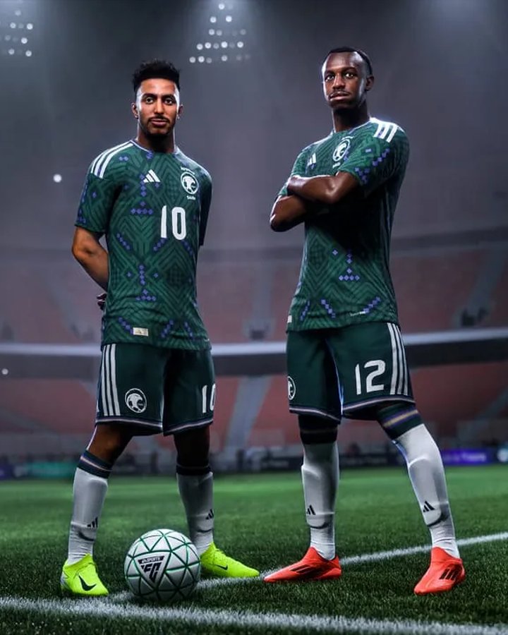 Two Saudi national team players in green kit on a floodlit pitch in EA Sports FC 26