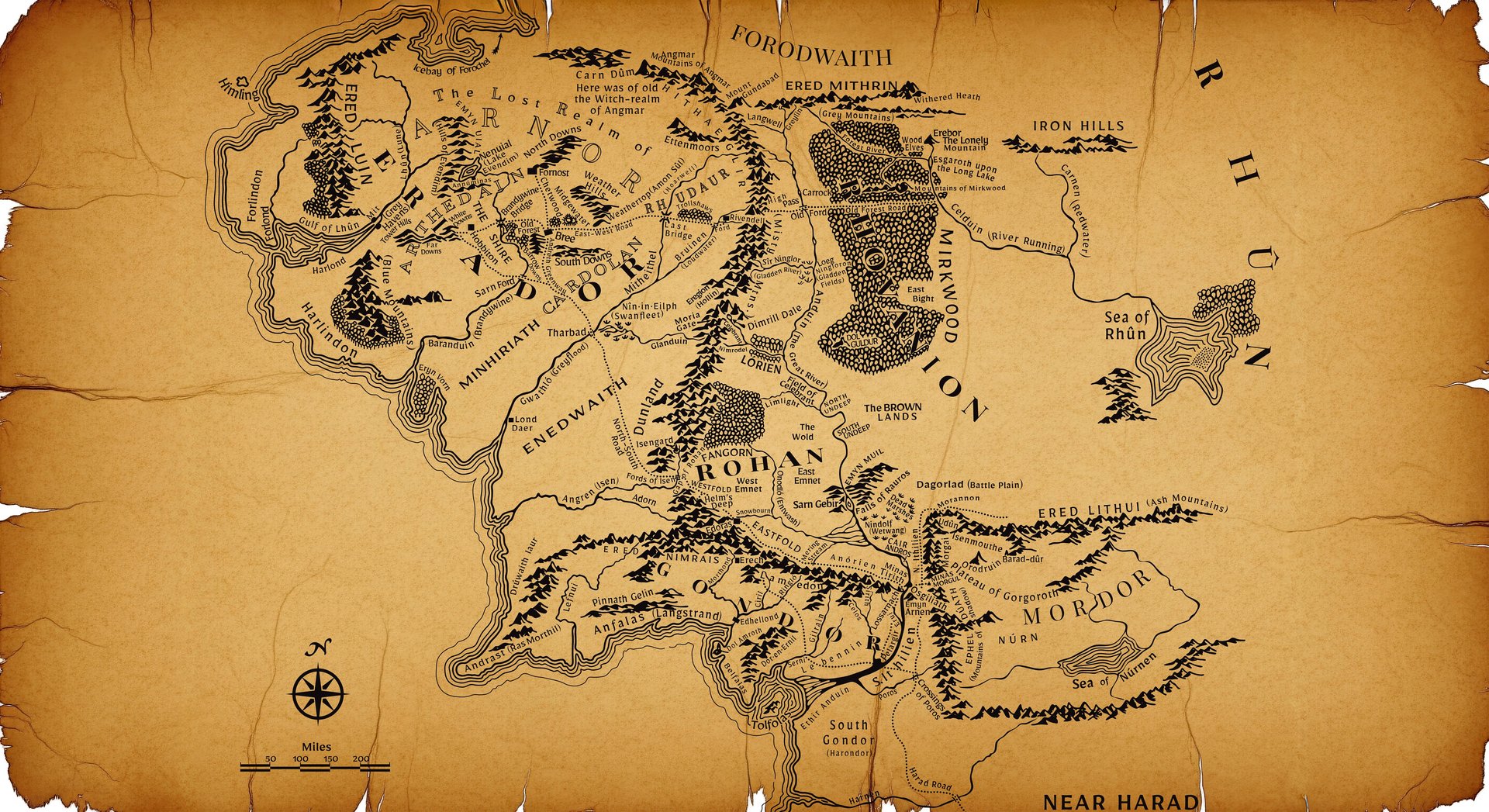 A detailed map of Middle-earth on aged parchment, showing the major regions from the Shire in the northwest to Mordor in the southeast.