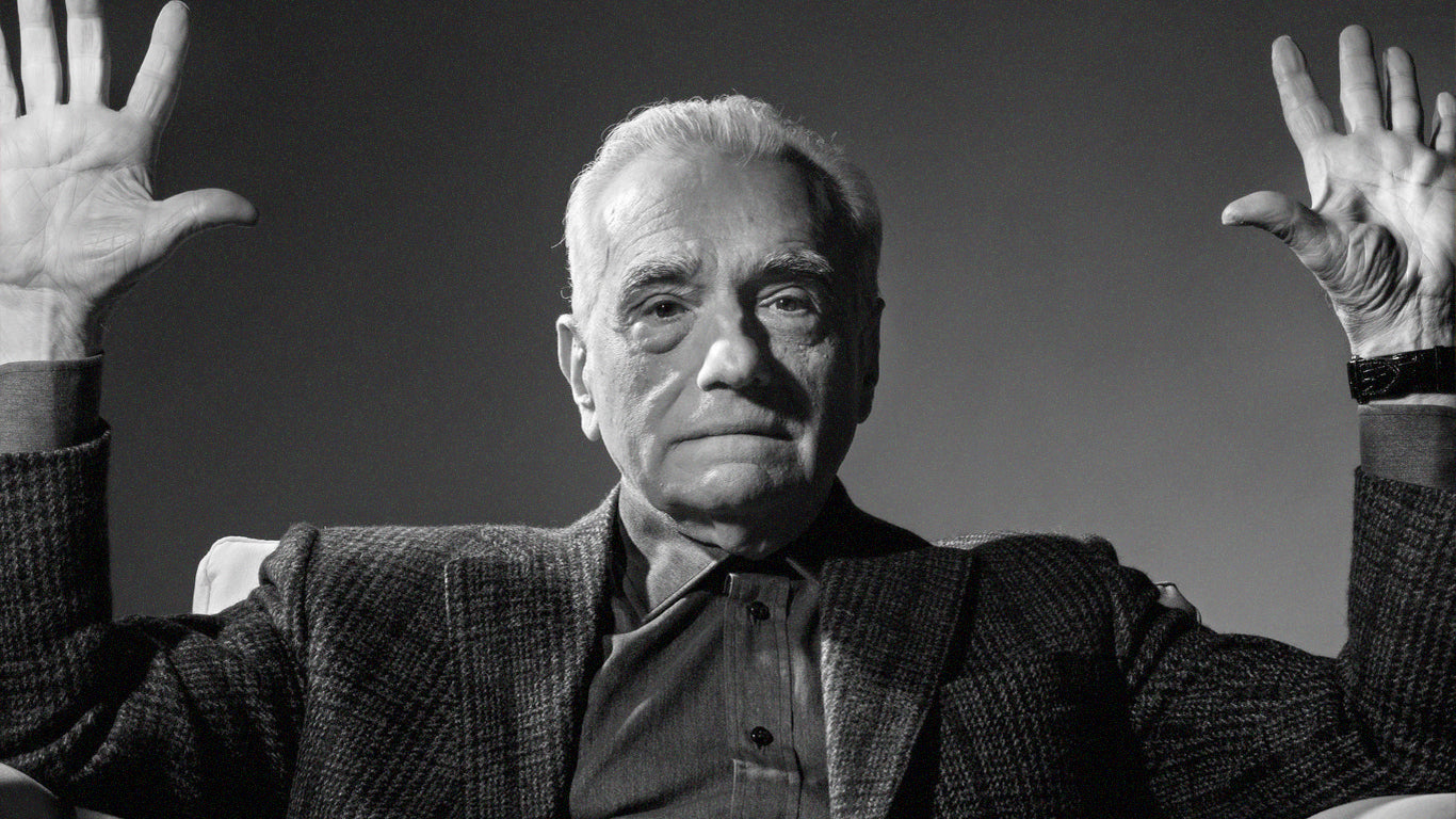A black-and-white portrait of Martin Scorsese